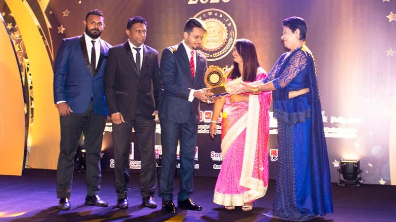 From left: Digital Media, Dineth Silva, Assistant General Manager, Dushantha Rangana and Director of Prime Group, Ruminda Randeniya receive the Gold award for the ‘Best Corporate Website in Sri Lanka’.