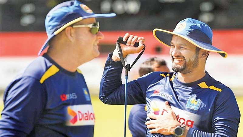 Sri Lanka captain Dimuth Karunaratne (right) and coach Mickey Arthur at a practice session
