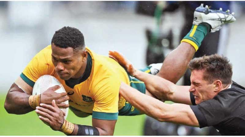 Australian winger Filipo Dauguna beats the New Zealand defence to score in the first Test that ended in a 16-16 thriller at Wellington last Sunday as the match was carried forward without a breakdown for nearly 10 minutes after the end hooter was blown