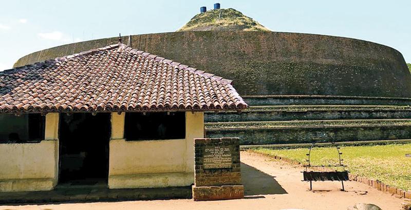 The massive Yudaganawa chaitya at Buttala and the small shrine room in the foreground