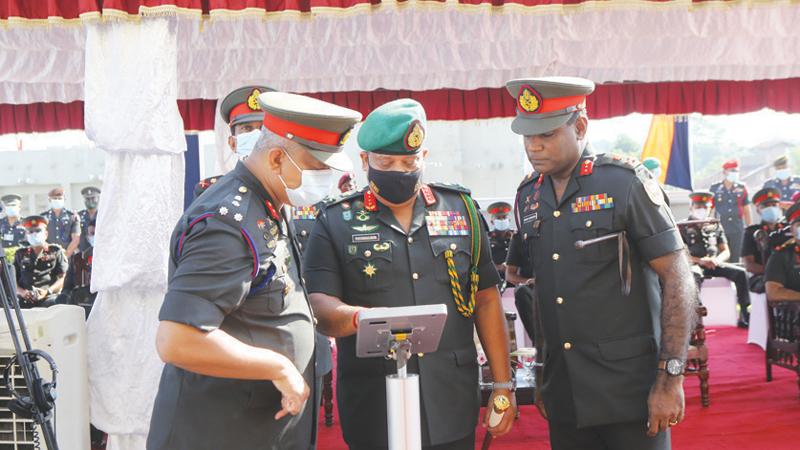 Army Commander Lt. Gen. Shavendra Silva inspects the drones