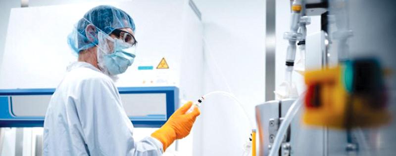 A researcher works in the German BioNTech laboratory in November.