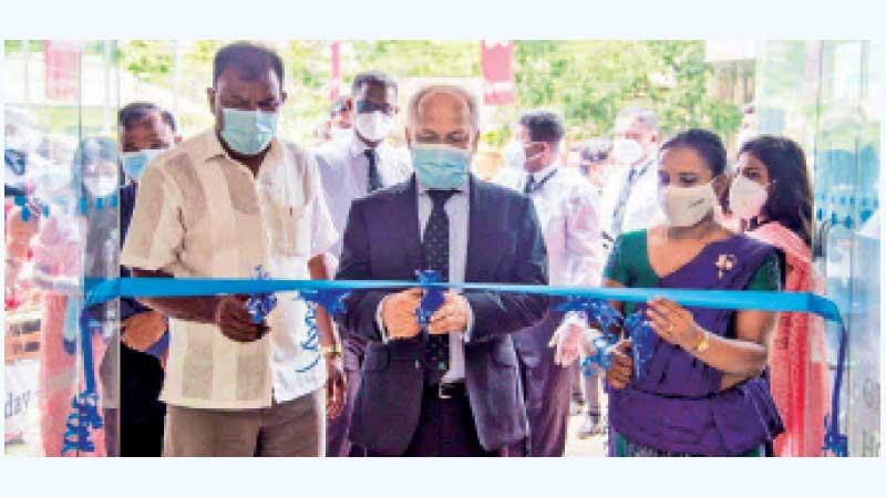 SDB bank Chief Executive Officer Thilak Piyadigama opens the branch.