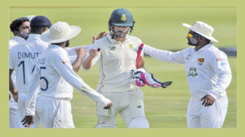 Sri Lankan fielders give South African century maker Faf du Plessis a congratulatory walk-back after they waited till he made 199 and lose his wicket in the first cricket Test last week