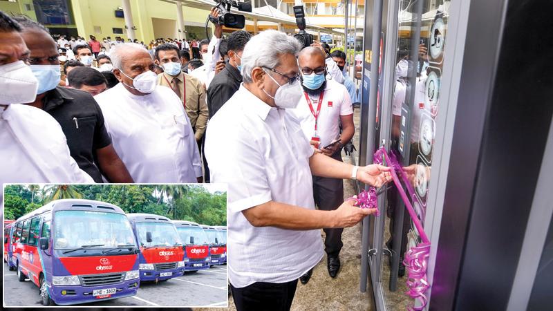 President Gotabaya Rajapaksa inaugurates the new bus service flanked by  Minister of Transport Gamini Lokuge, State Minister Dilum Amunugama and Secretaries of the Line Ministries.