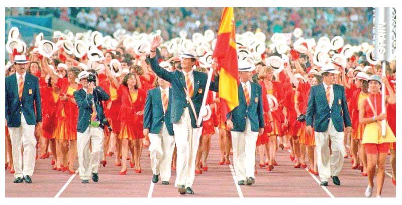 Then Prince, now King of Spain, Philip VI leads the Spanish Olympic team as the flag bearer at the Opening Ceremony