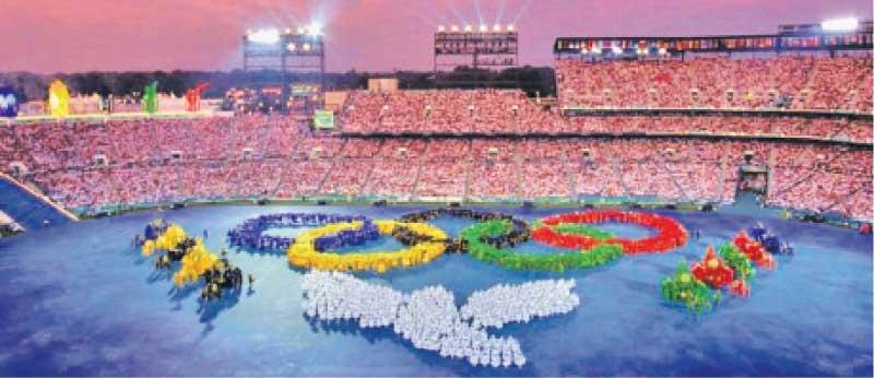 Olympic rings formed by performers at the opening ceremony