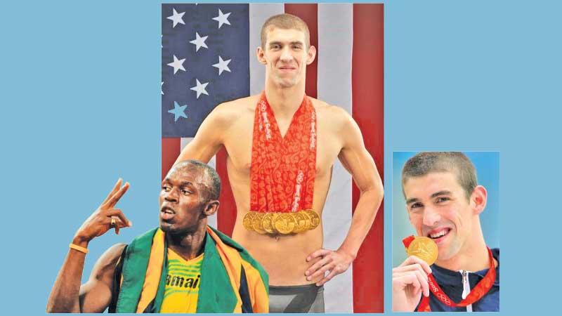Usain Bolt in action-Michael Phelps – Eight Swimming Olympic Golds