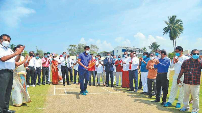 Sri Lanka cricketer Upul Tharanga demonstrates batting at the revamping of the cricket ground in Ambalangoda under the auspices of Sri Lanka Cricket