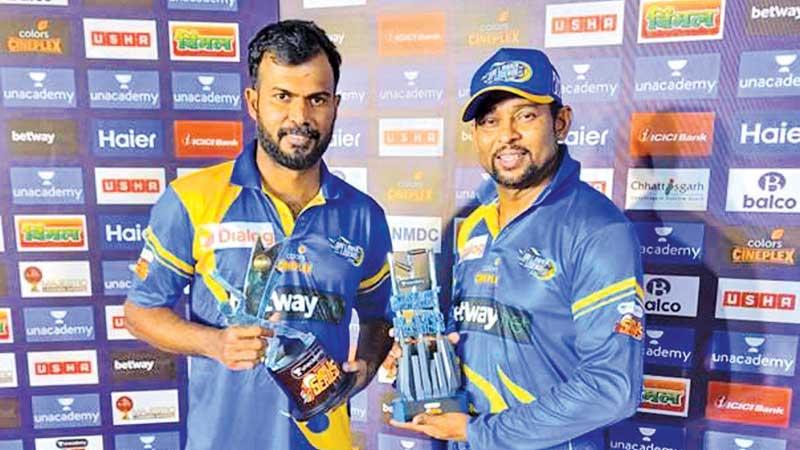 Sri Lanka Legends captain Tillekaratne Dilshan (right) with Man of the Match Upul Tharanga after beating Banglaesh Legends in a qualifying round match. The Sri Lanka Legends are sponsored by Dialog
