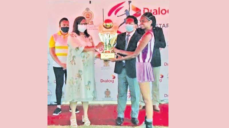 Amali Nanayakkara, Group Chief Marketing Officer, Dialog Axiata PLC and Anuradha Wijekoon, Secretary – Ministry of Youth and Sports, presenting the champions trophy to Chamudi Dilrukshi Wickramaratne, captain of the winning Western Province team