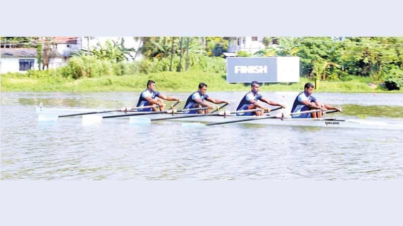 The champion Army team at last week's rowing nationals made up of Chinthaka, Senaratne, Bandara and Medonza on their way to the finish (Pix by Nirosh Batepola)