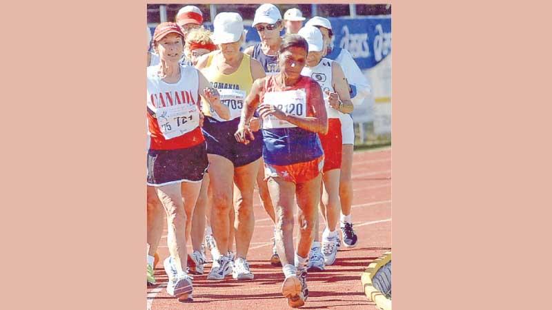 Mallika Sachithananda (right) in one of her race walks