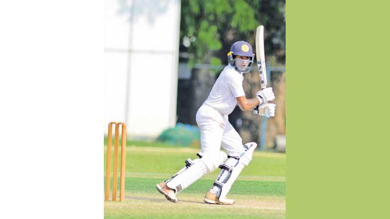 Mahanama College batsman Pavan Ratnayake cuts a ball to the boundary during his half century (75) in the second innings against Thurstan College at Thurstan ground yesterday. He made a hundred in the first innings (Pic Hirantha Gunathilaka)
