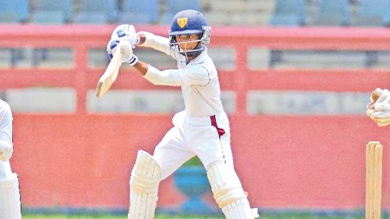 Mahoshode Fernando of Ananda College plays a stroke in their inter-school cricket encounter against Royal College at Ananda Mawatha yesterday (Pic by Hirantha Gunathillake)