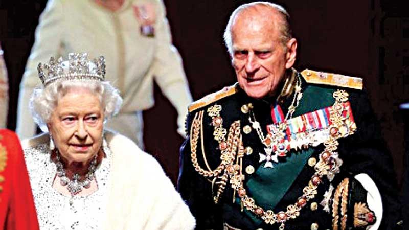 Queen Elizabeth II and Prince Philip at the Palace of Westminster after the state opening of Parliament on May 8, 2013 in London.