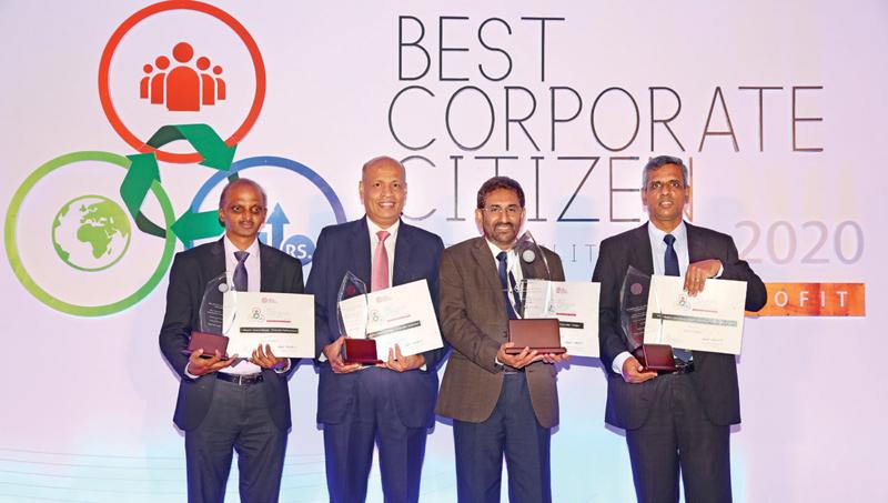 The Bank of Ceylon General Manager D.P.K. Gunasekera (middle) with the Award received for Bank of Ceylon as “one of the Top Ten Best Corporate Citizens” in Sri Lanka. (L to R) AGM Human Resource K.A.D. Wijayawardena, DGM Human ResourceK.E.D. Sumanasiri and DGM Finance and PlanningM.P. Ruwan Kumara are also in the picture with three category awards received for the Bank.  