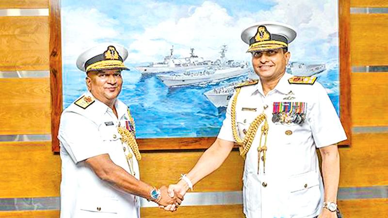 Rear Admiral Senarath Wijesooriya with Navy Commander Vice Admiral Nishantha Ulugetenne