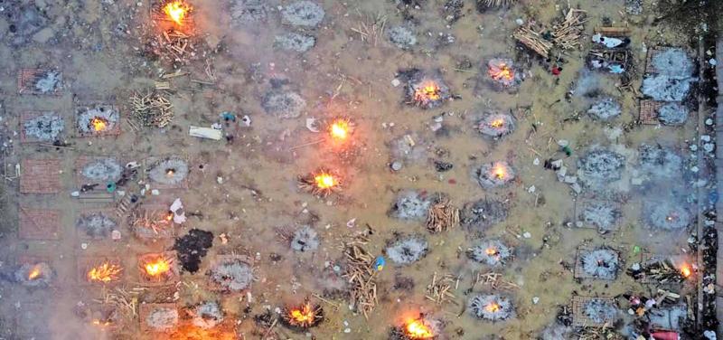 Burning Covid-19 victims in India