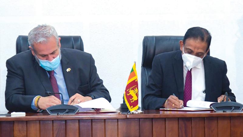 Secretary to the Ministry of Finance, Sajith Attygalle and World Bank Country Director for the Maldives, Nepal and Sri Lanka, Faris H. Hadad-Zervos sign the agreement.