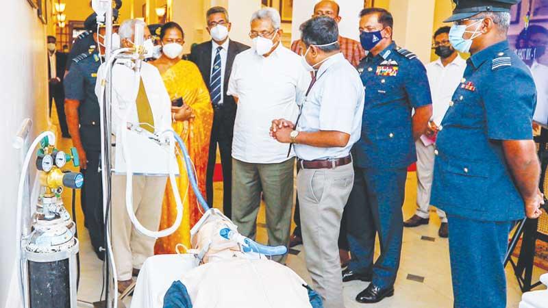 President Gotabaya Rajapaksa takes a close look at the equipment