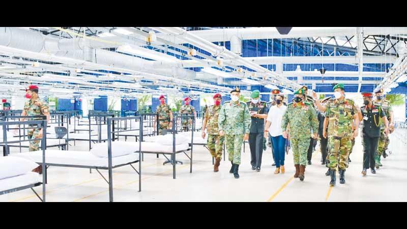 Army Commander Gen. Shavendra Silva arrives at the improvised hospital