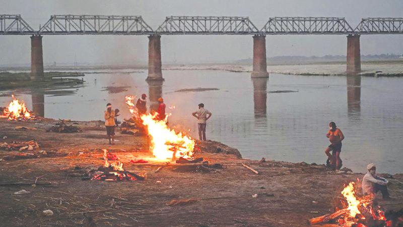 Bodies of Covid-19 victims being burnt on the banks of the Ganges.