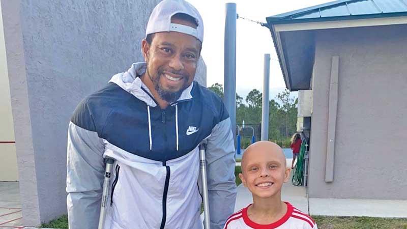 Tiger Woods with new found friend Luna Perrone