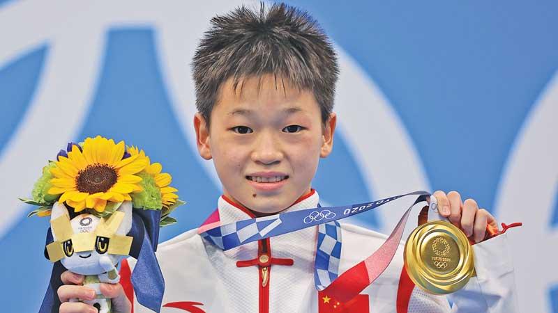 Quan Hongchan with her gold