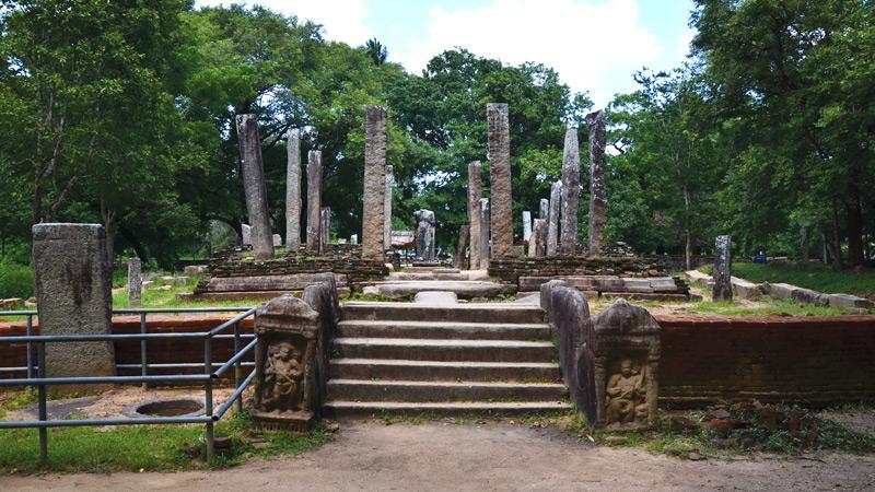 The limestone standing torso of the Buddha in the Image House