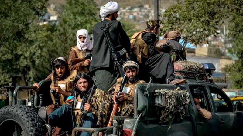 Taliban fighters patrol along a street in Kabul after US troops' withdrew from Afghanistan, (AFP)