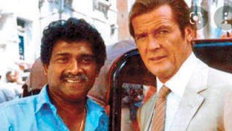 With British actor Roger Moore
