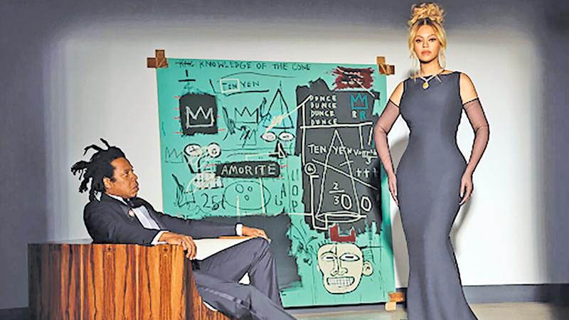 Beyoncé and Jay-Z — and ‘Equals Pi’ by Jean-Michel Basquiat — in the Tiffany & Company fall 2021 campaign, titled ‘About Love.’ Credit: Mason Poole