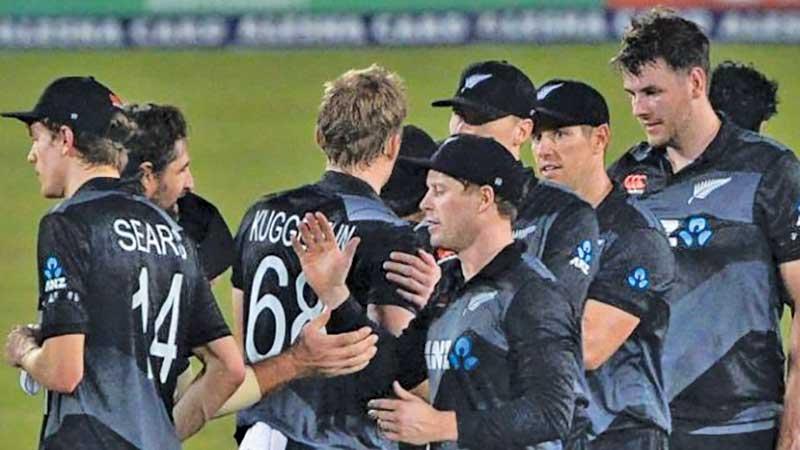 Members of the New Zealand team come together