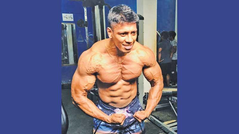 Incredible Hulk or Iron Mike Tyson. Tharindu flexing his muscles like a bodybuilder