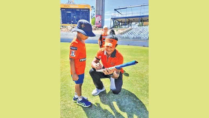 Chamari Atapattu obliges a young fan