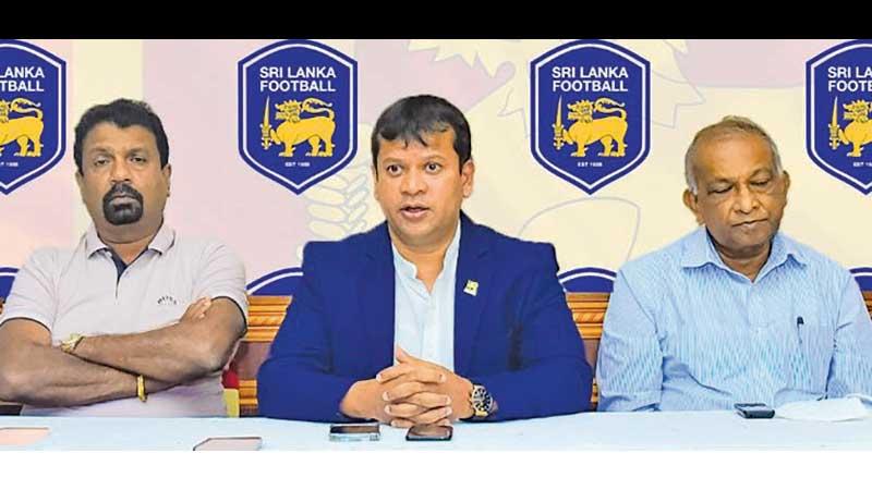 Jaswar Umar (centre), President of Football Sri Lanka spells out his plans further inspired by the showing of the team at the SAFF championship in the Maldives flanked by Ranjith Rodrigo (VP) and KPP Pathirana (VP)
