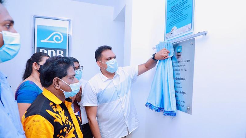 The plaque being unveiled