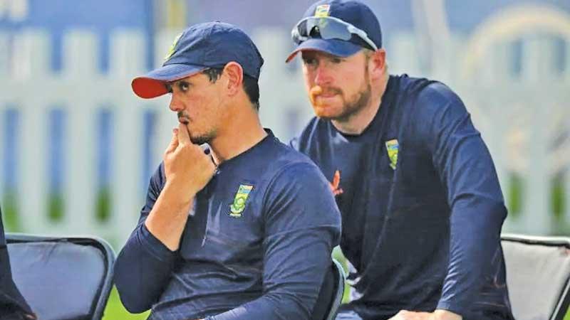 Quinton de Kock (left)