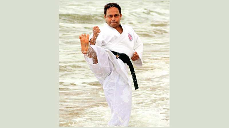 Athula Dhammika Minithanthri performing Kata on camera