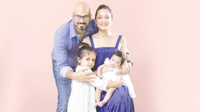 Samaranayake with his wife Lucky and children
