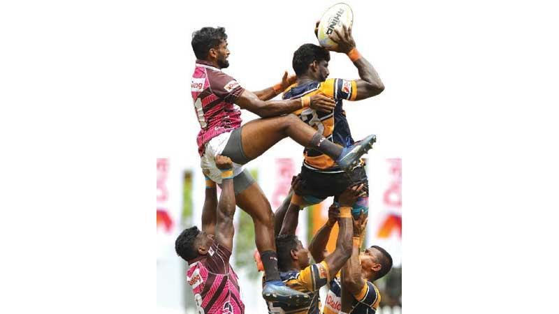 Rugby players from Havelocks (left) and Army Sports Club compete for the ball in a line-out put-in at last month’s Warrior Sevens