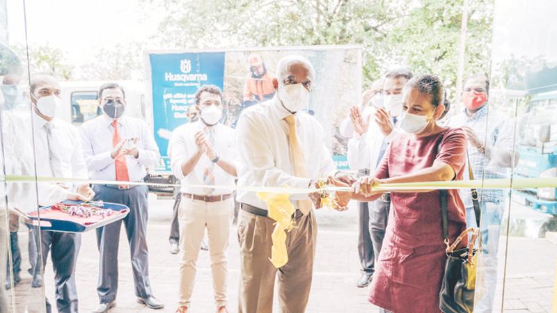 Chairman of St. Anthony’s Hardware, S. R. Gnanam opens the building
