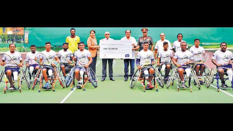 Representatives of CICT, HIPG and the SLTA at the symbolic presentation of the donation to the Wheelchair Tennis Programme