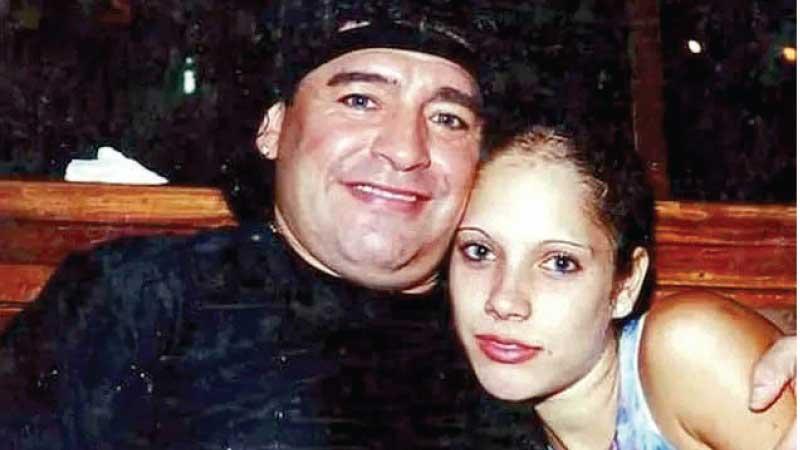 The late Diego Maradona (left) with his accuser Mavys Alvarez
