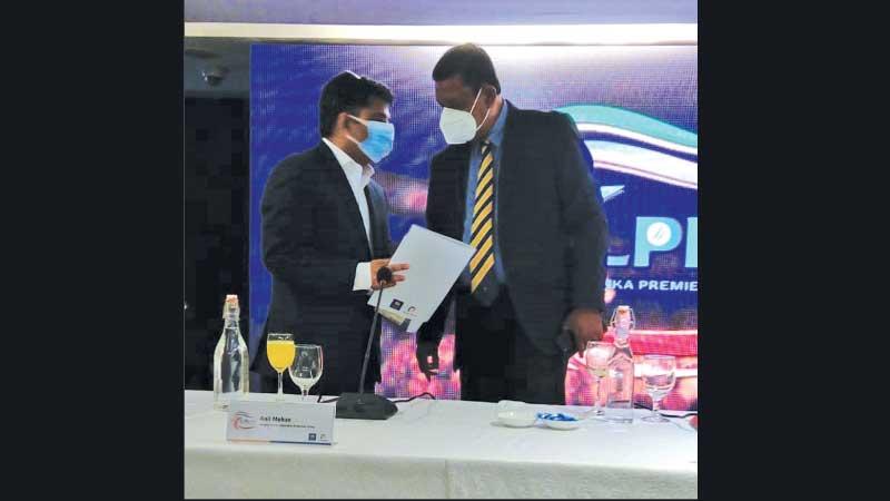 Sri Lanka Cricket vice president Ravin Wickremaratne (right) makes a query from the master rights holder of the LPL Anil Mohan at a question-filled launch of the tournament’s second season at the Cinnamon Grand Hotel in Colombo (Picture by Hirantha Gunathilaka)