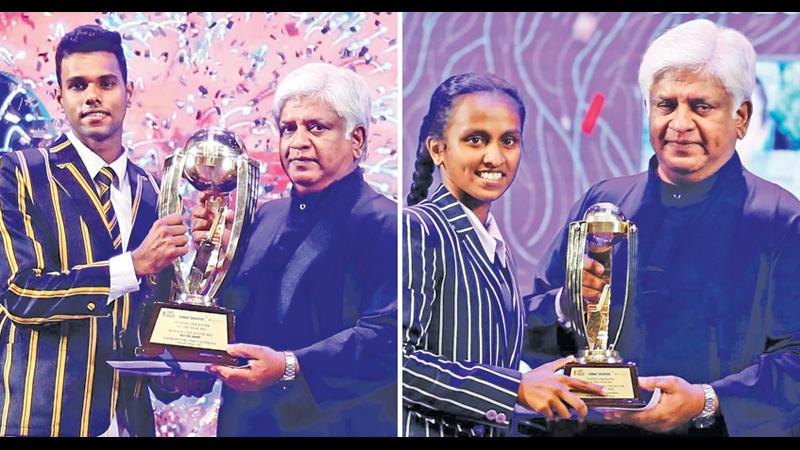 Sunday Observer-SLT Mobitel Schoolboy Cricketer of the Year Navod Paranavithana of Mahinda College in Galle receives his prize from former Sri Lanka captain Arjuna Ranatunga at the BMICH in Colombo-Sunday Observer-SLT Mobitel Schoolgirl Cricketer of the Year Nethmi Senaratne of Wadduwa Central College receives her prize from Arjuna Ranatunga