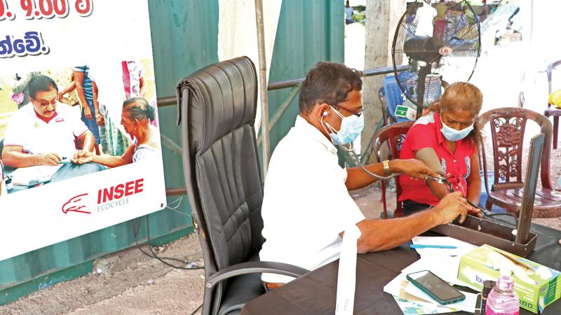Senior citizens being examined at the medical camp.