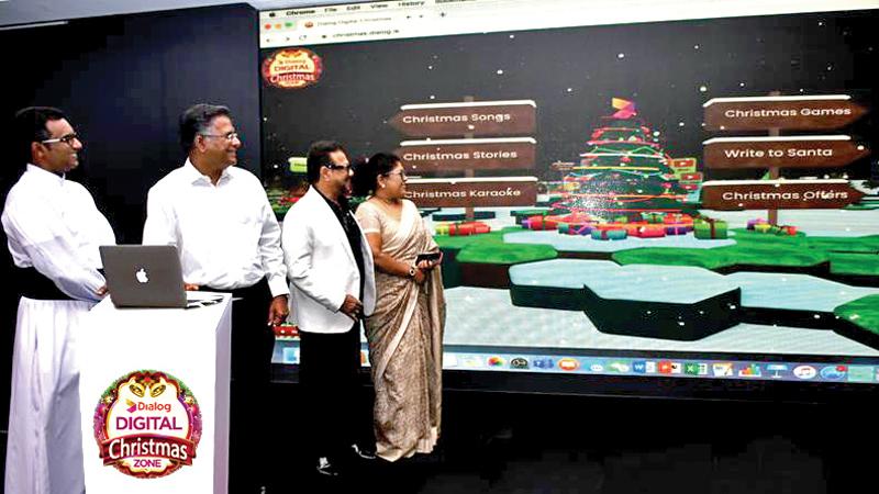 The Dialog Digital Christmas Zone was launched by Group Chief Technology Officer at Dialog Axiata, Pradeep De Almeida, husband and wife singing duo Rookantha Gunathilake and Chandralekha Perera and Rector of St. Joseph’s College, Nugegoda Fr. Lakmin Silva.