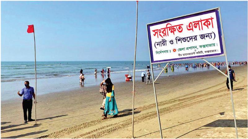 A sign saying the beach was reserved for women and children was erected along one stretch on Cox’s Bazaar, before the decision was quickly reversed
